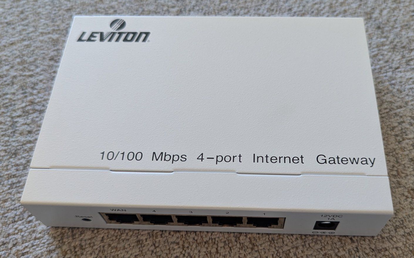 Leviton 47611-GT4 10/100 Mbps 4-Port Internet Gateway Router - Home or Office Use