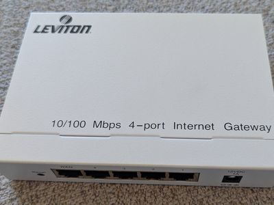 Leviton 47611-GT4 10/100 Mbps 4-Port Internet Gateway Router - Home or Office Use