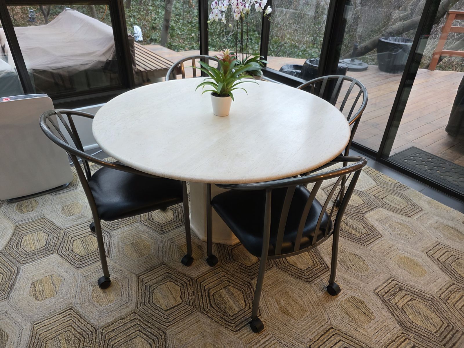 Round Travertine table with chairs