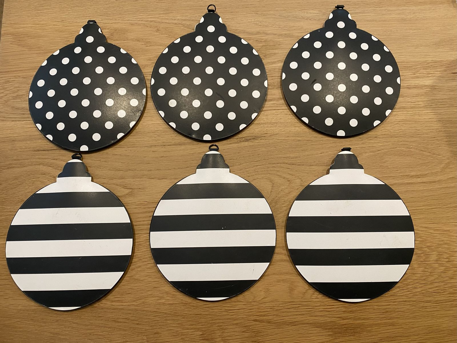 Six Large Black and White Metal Ornaments