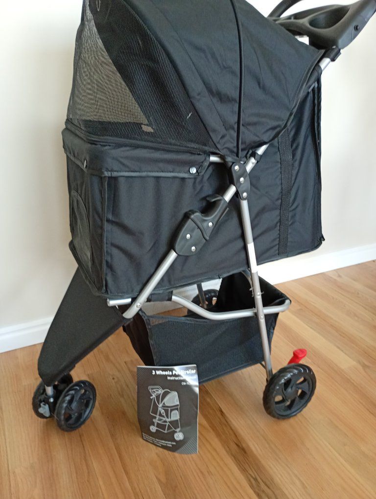 Black 3-Wheel Pet Stroller with Storage Basket & Mesh Canopy - new, never used.