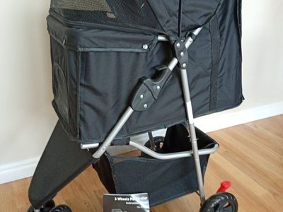Black 3-Wheel Pet Stroller with Storage Basket & Mesh Canopy - new, never used.