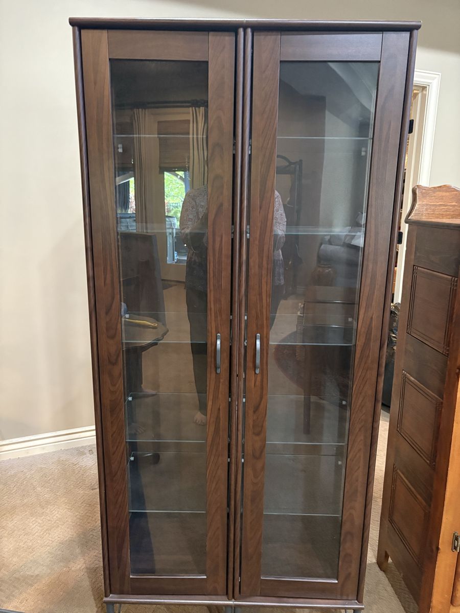IKEA Dark Wood Display Cabinet with Glass Shelves and Doors - Modern Storage Solution