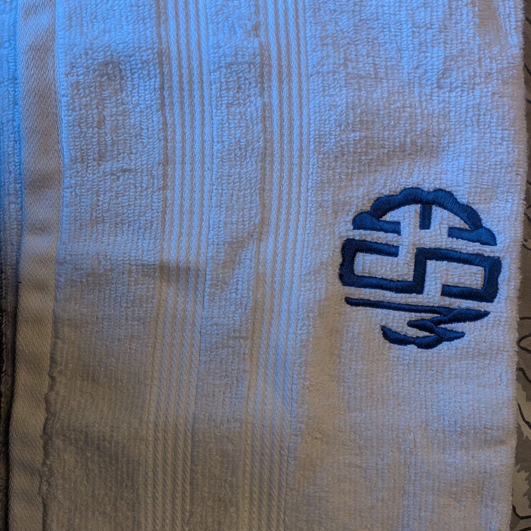 White bath towels with one hand towel