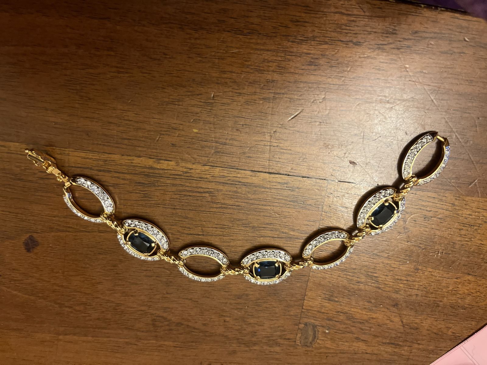 Gold Tone Rhinestone Link Bracelet with Blue Stones