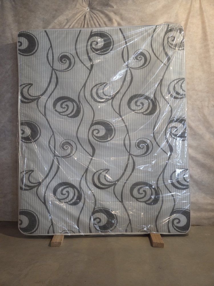 Patterned Mattress Sealed in Protective Plastic Wrap