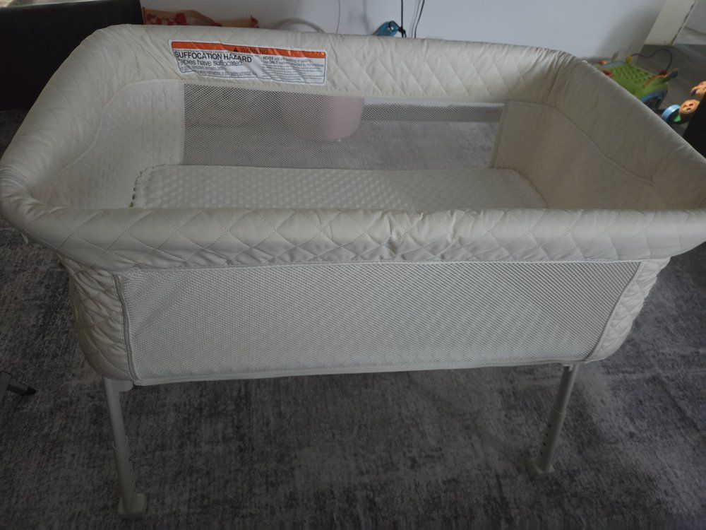 Gently used bedside bassinet