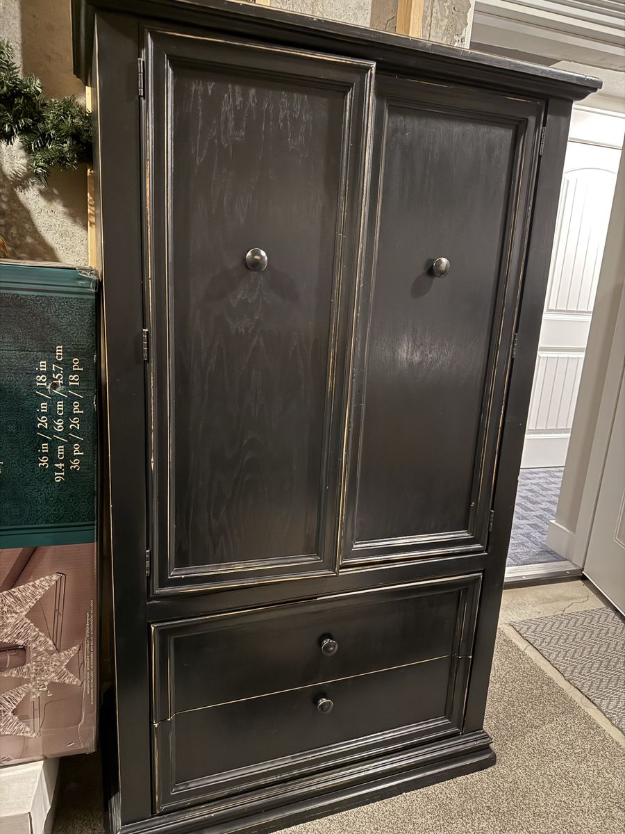 Black wood armoire cabinet