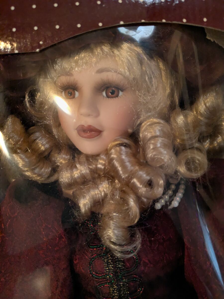 "Elegance". collectors porcelain doll