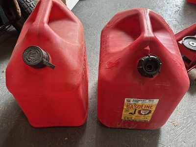 2 - 5 gallon gas cans