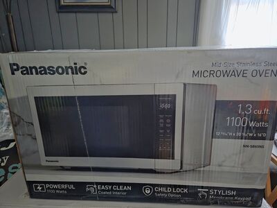 Brand new in box Panasonic 1.3 cu ft Countertop Microwave Oven in Glass Door