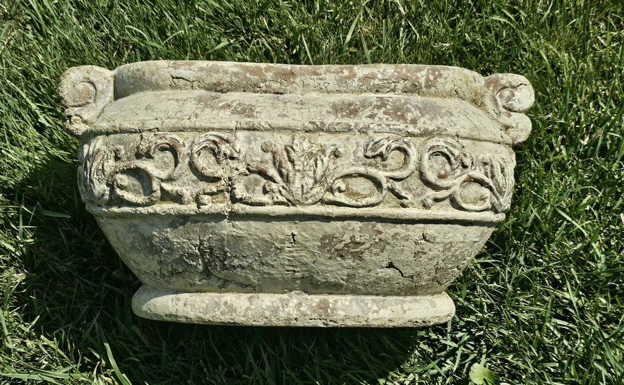 Vintage Style Concrete Garden Planter Urn with Embossed Scroll Detailing
17"Lx9.5"Hx11"W