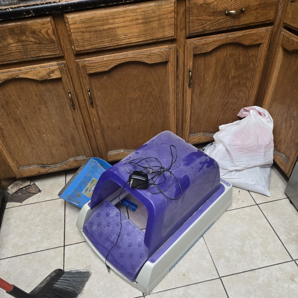 Automatic cat litter box.