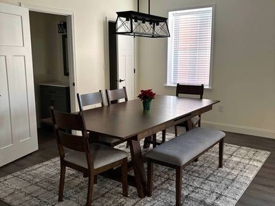 Dining table with drop down extender