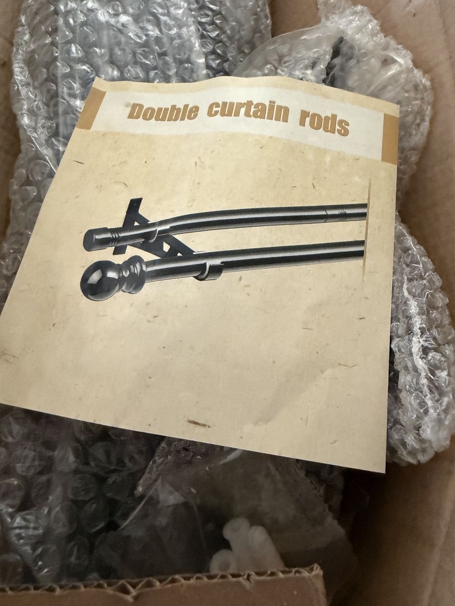 Brand new! Double curtain rods
