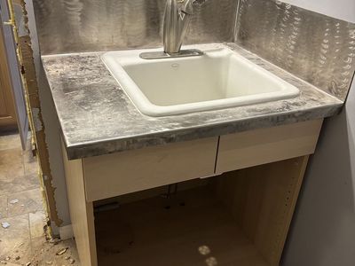 Laundry room vanity with deep sink