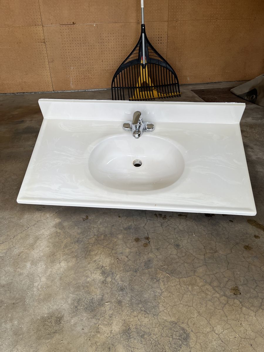White Cultured Marble Vanity Top with Integrated Sink and Chrome Faucet