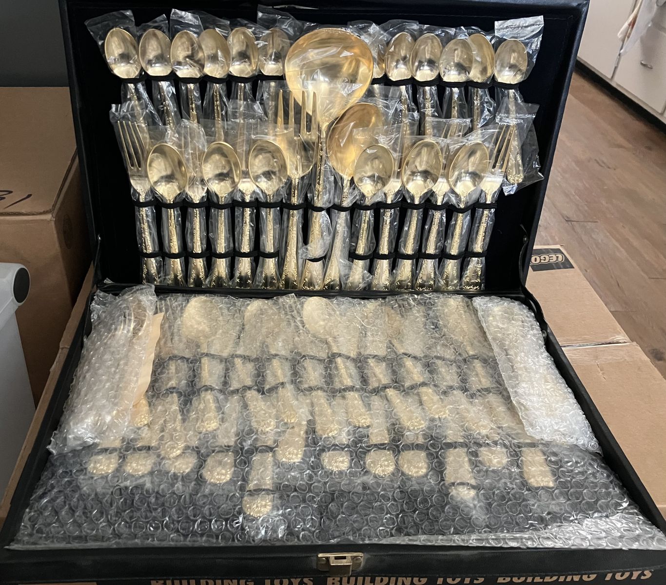 63-piece gold-plated flatware service for 12