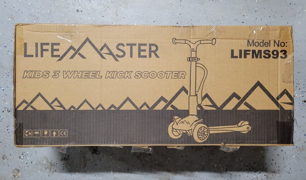 NIB  -Pink,  light up, 3 wheel sit and stand scooter