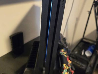 PlayStation 4 Pro (1TB) + 2 Controllers & 10 Games Bundle – Excellent Condition