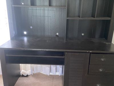 Black Wooden Office Desk with Attached Hutch Shelving and Drawers