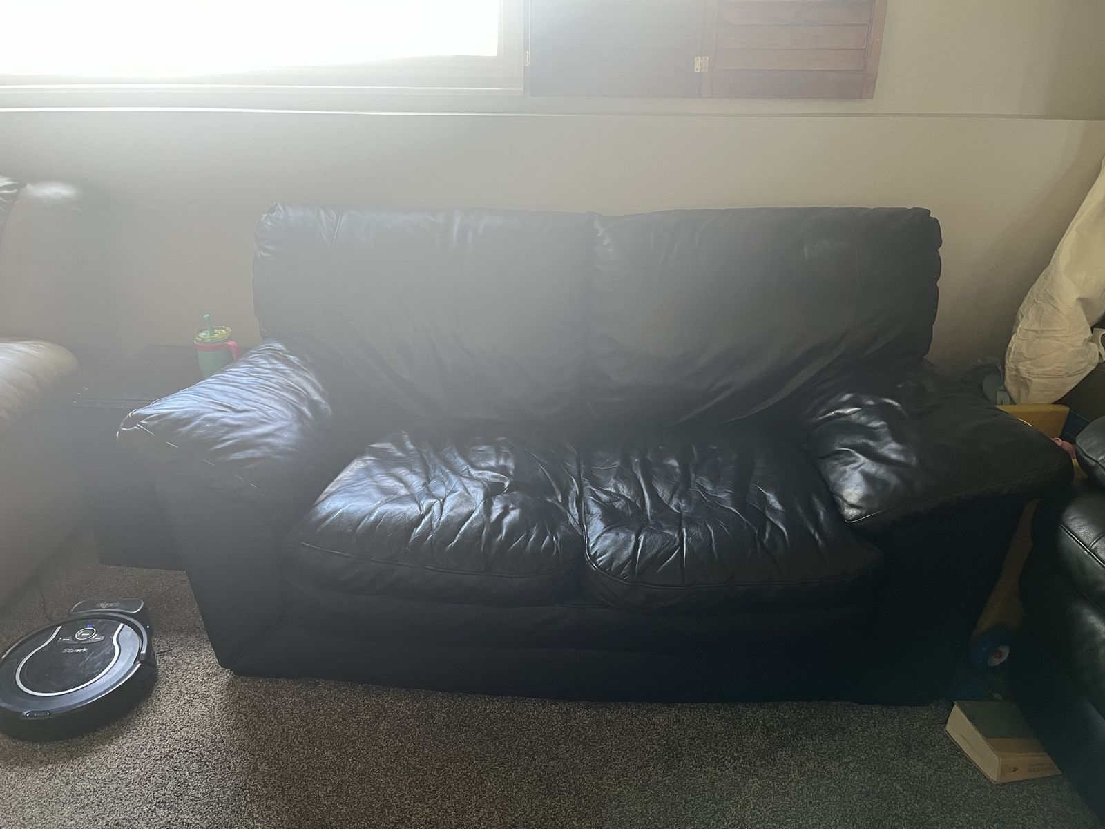Faux black leather couch
