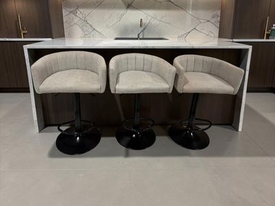Set of 3 Modern Adjustable Bar Stools with Beige Fabric Upholstery and Black Metal Bases