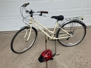 Cream Step-Through Commuter Bike with Rear Rack and Helmet