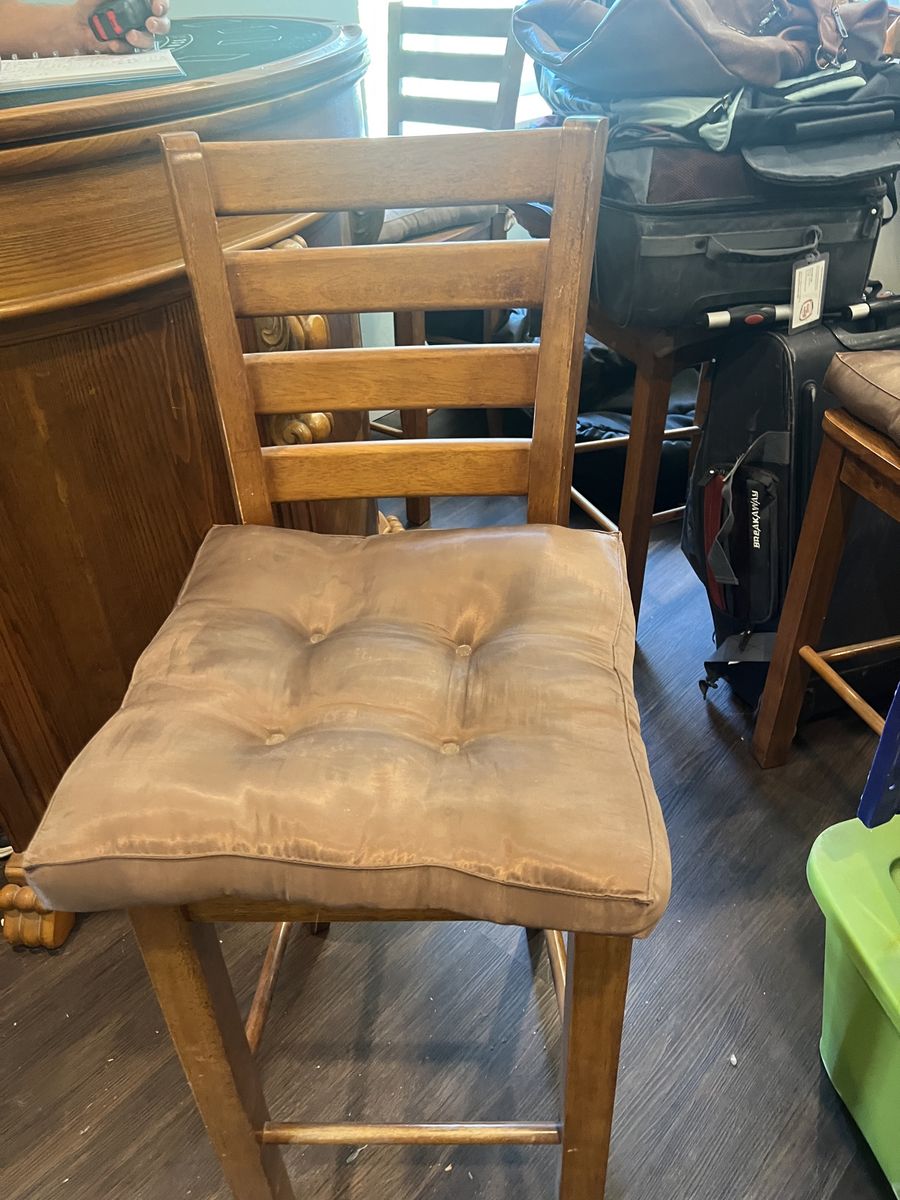 Four solid wood bar stools
