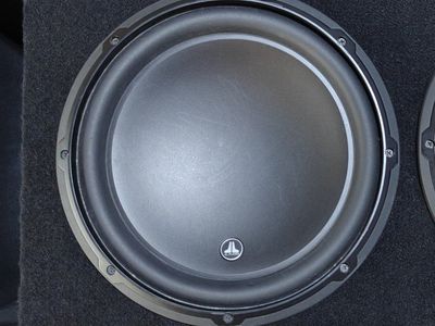 2x JL Audio 12W3v3-4 26Hz ported box + 1500W amp