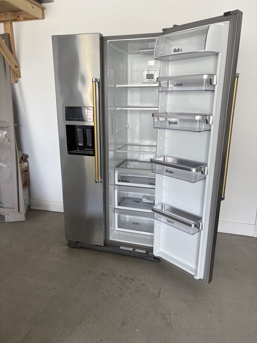 KitchenAid Stainless Steel Side-by-Side Refrigerator with Gold Handles