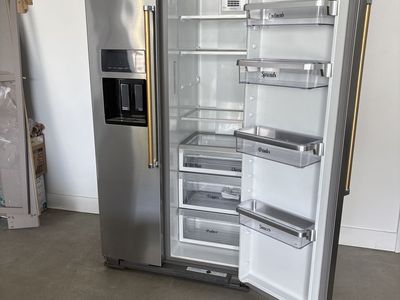 KitchenAid Stainless Steel Side-by-Side Refrigerator with Gold Handles