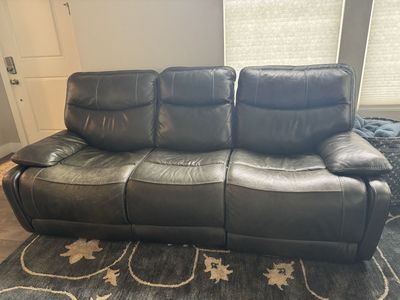 Dark Gray Leather Reclining Sofa and Loveseat Set