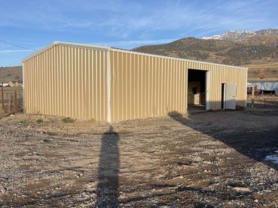 Shop with office and 1.5 archer industrial parking lot.