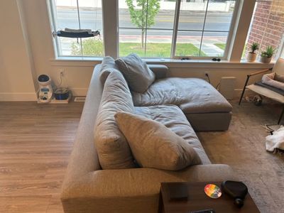 Spacious Grey Sectional Sofa with Reversible Chaise - Excellent Condition, Comfortable Seating