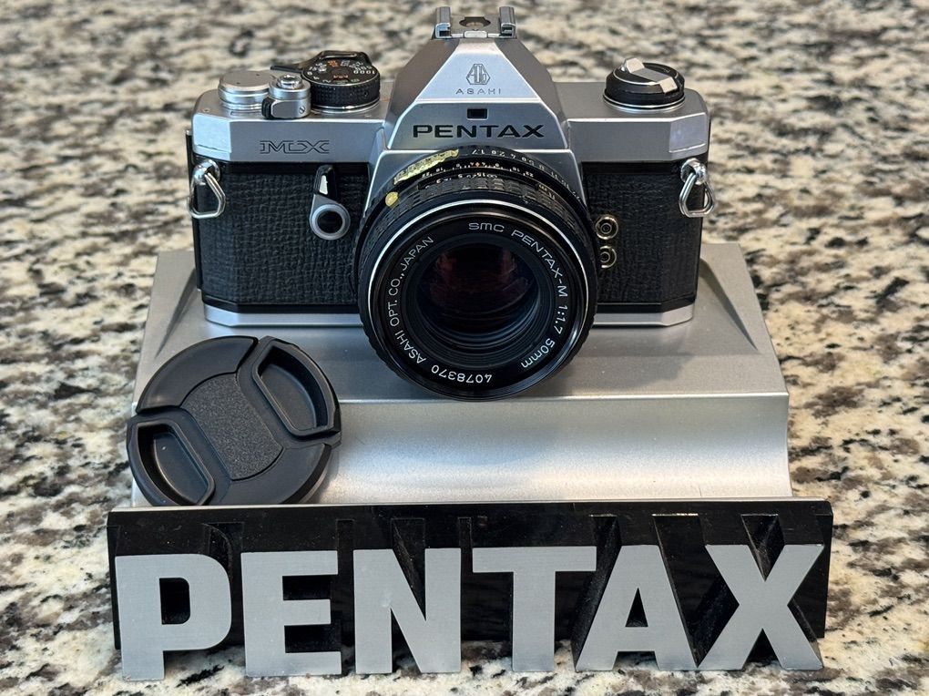 Pentax MX 35mm film camera SLR with 50mm prime lens