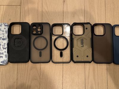 7 gently used iPhone cases, various sizes