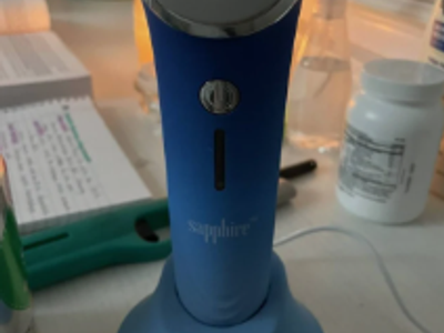 Sapphire Blue Light Therapy Acne Treatment Device with Charging Base ...... make me an offer