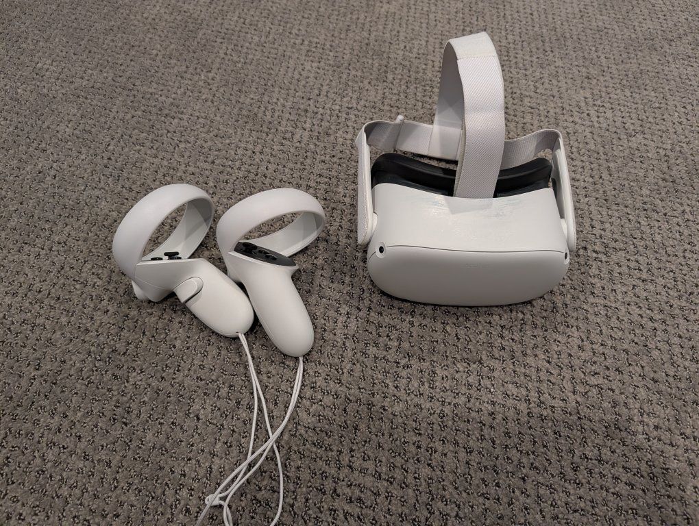 Meta Quest 2 VR Headset with Controllers with box- Used