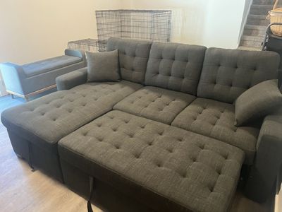 MATCHING SET: Spacious Dark Gray Tufted Sectional Sleeper Sofa with Matching Storage Ottoman - Excellent Condition