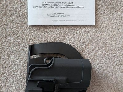 Glock19 size Holster: Blackhawk SERPA CQC Standard Concealment Holster with Belt Loop Platform - Black