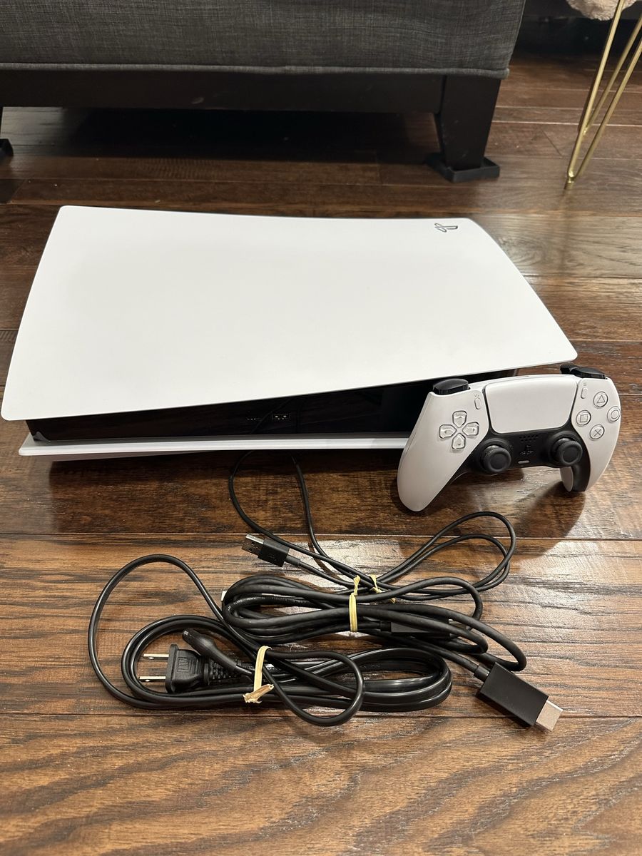 PS5 disc console bundle with controller and 3 games.