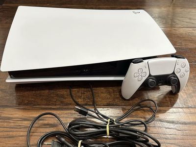 PS5 disc console bundle with controller and 3 games.