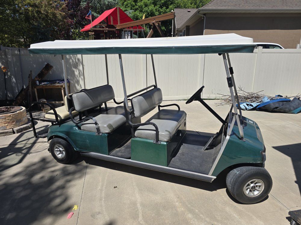 Club Car Golf Cart - Green 6-Seater with Cargo Bed & White Canopy
