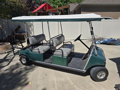 Club Car Golf Cart - Green 6-Seater with Cargo Bed & White Canopy