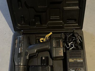 Cordless drill plus charger and case