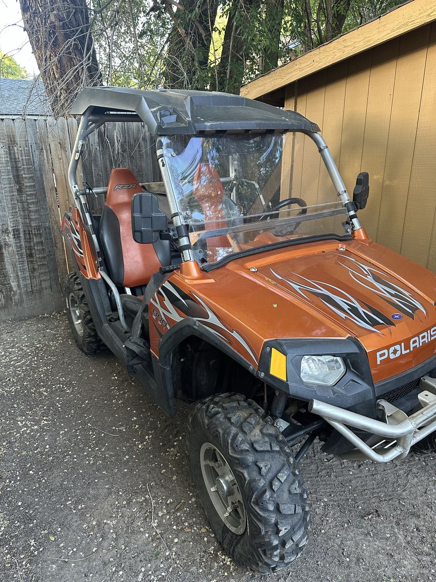 Polaris RZR 800 Orange Utility Side-by-Side UTV with Windshield and Roof  & mirrors