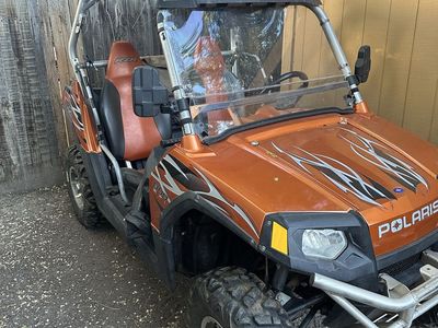 Polaris RZR 800 Orange Utility Side-by-Side UTV with Windshield and Roof & mirrors