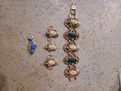 bracket earrings and fish pendant