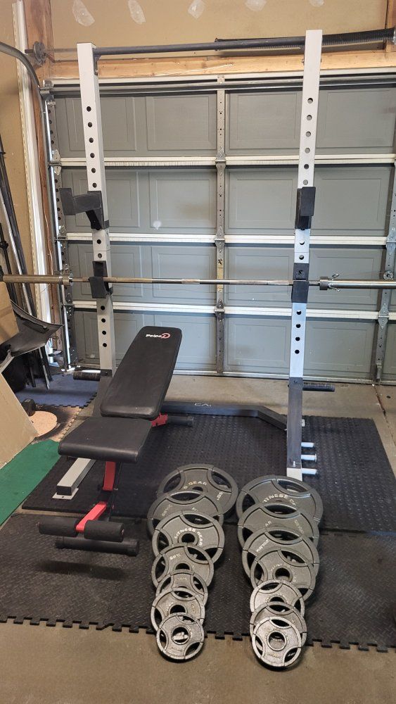 Squat rack and 255 pounds of weights